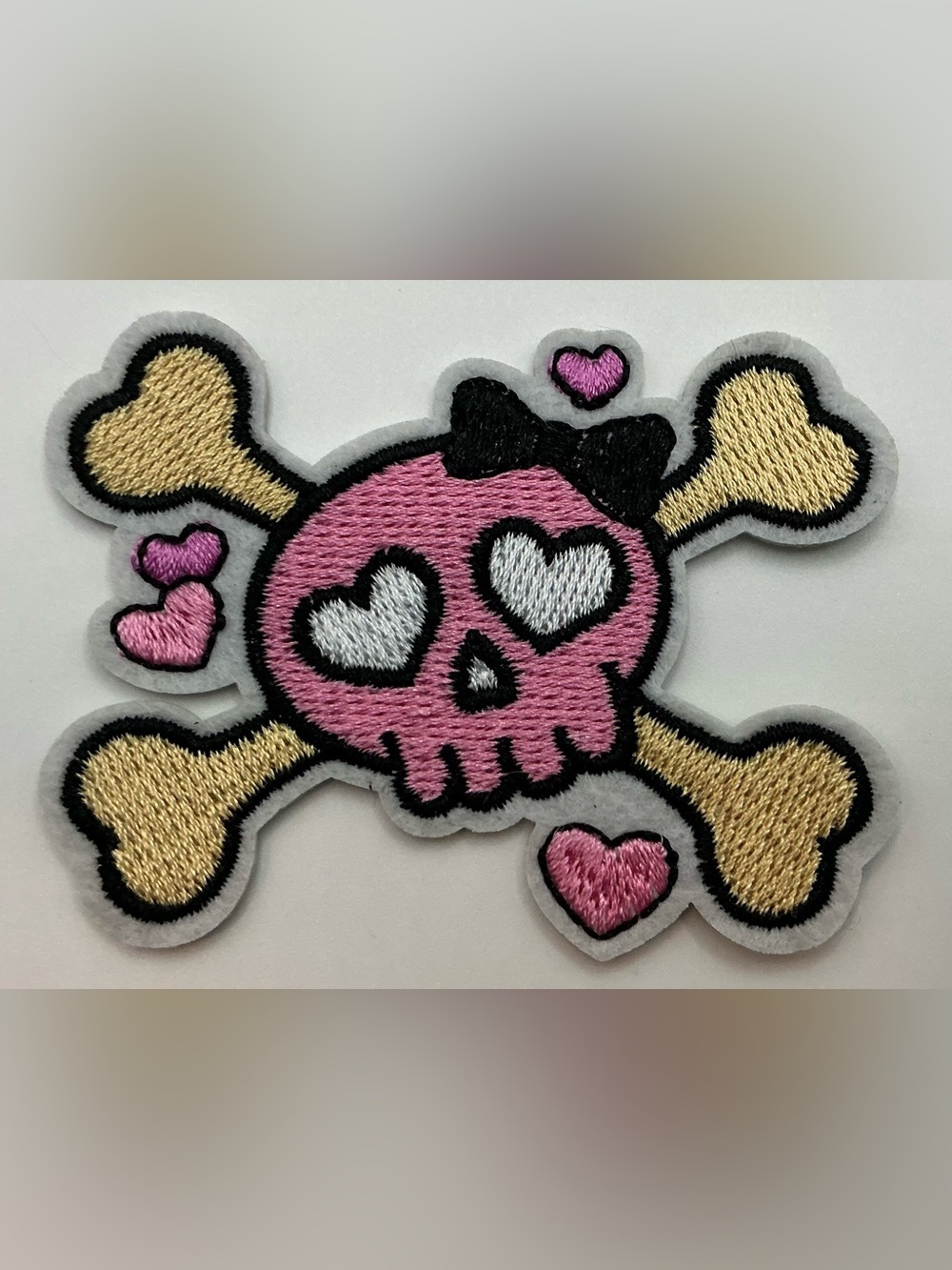 IRON OR SEW ON PATCH BLACK CREAM COLOR GIRLY SKULL BOW HEART EYES NWOT